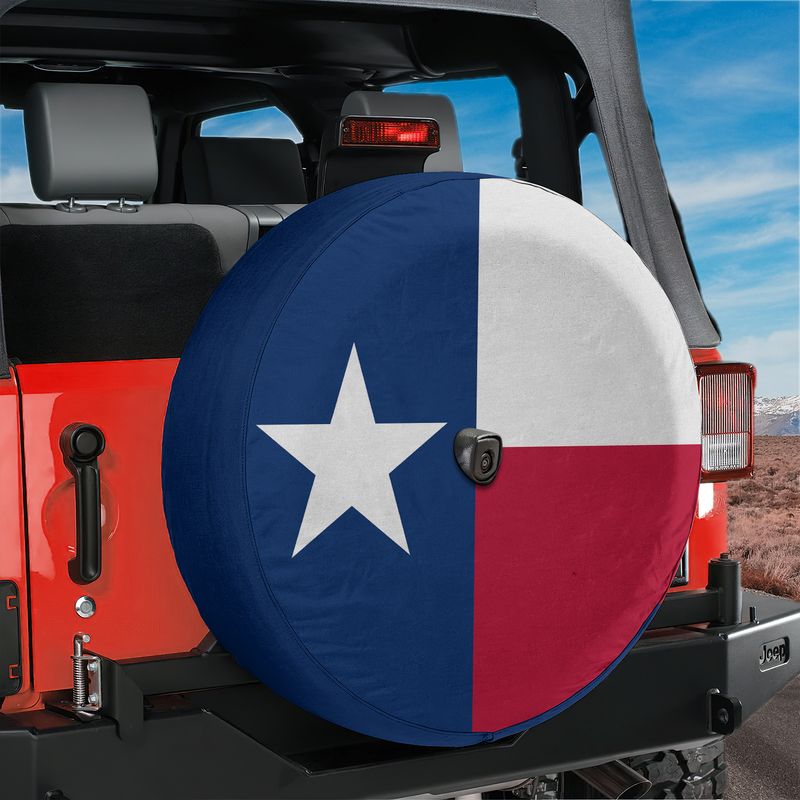 Texas state flag spare tire cover studio shot showing blue panel with white star and red white bars camera cutout