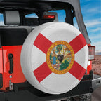 Florida state flag spare tire cover studio shot showing red saltire on white field with central state seal