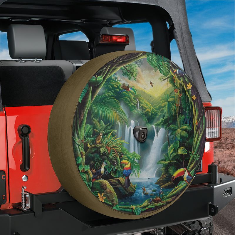 Tropical paradise tire cover on a red Jeep Wrangler with rainforest waterfall art and backup camera hole