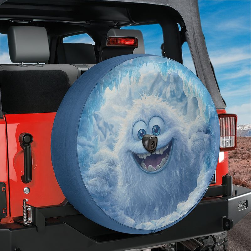 Yeti Peek-a-Boo spare tire cover product shot showing the round cover featuring the smiling snow yeti illustration