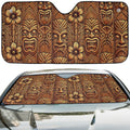 Tribal Tiki woodgrain auto sunshade artwork displayed flat above an installed windshield mockup view