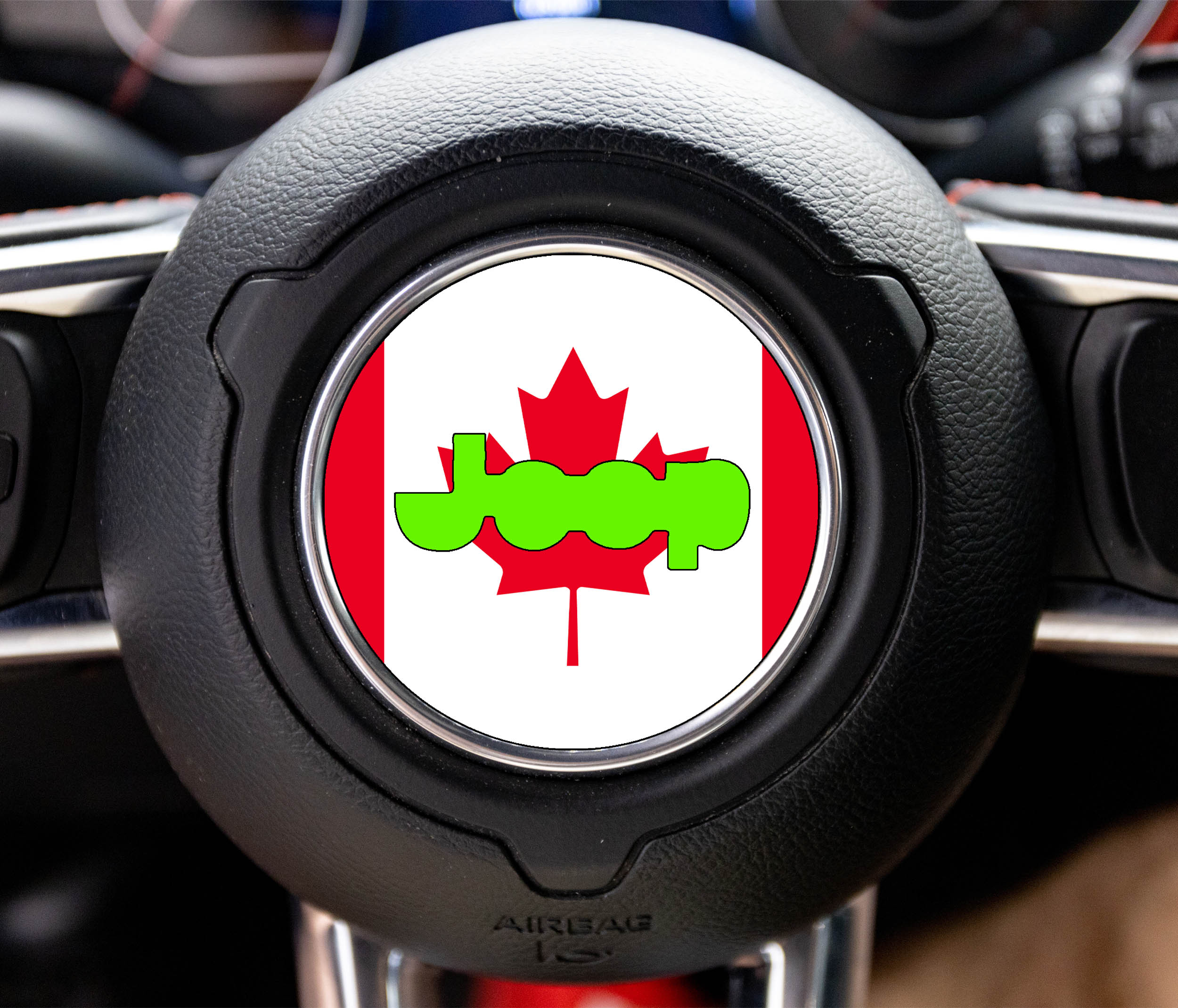 Canadian flag red maple leaf Jeep steering wheel airbag center decal overlay shown installed wheel