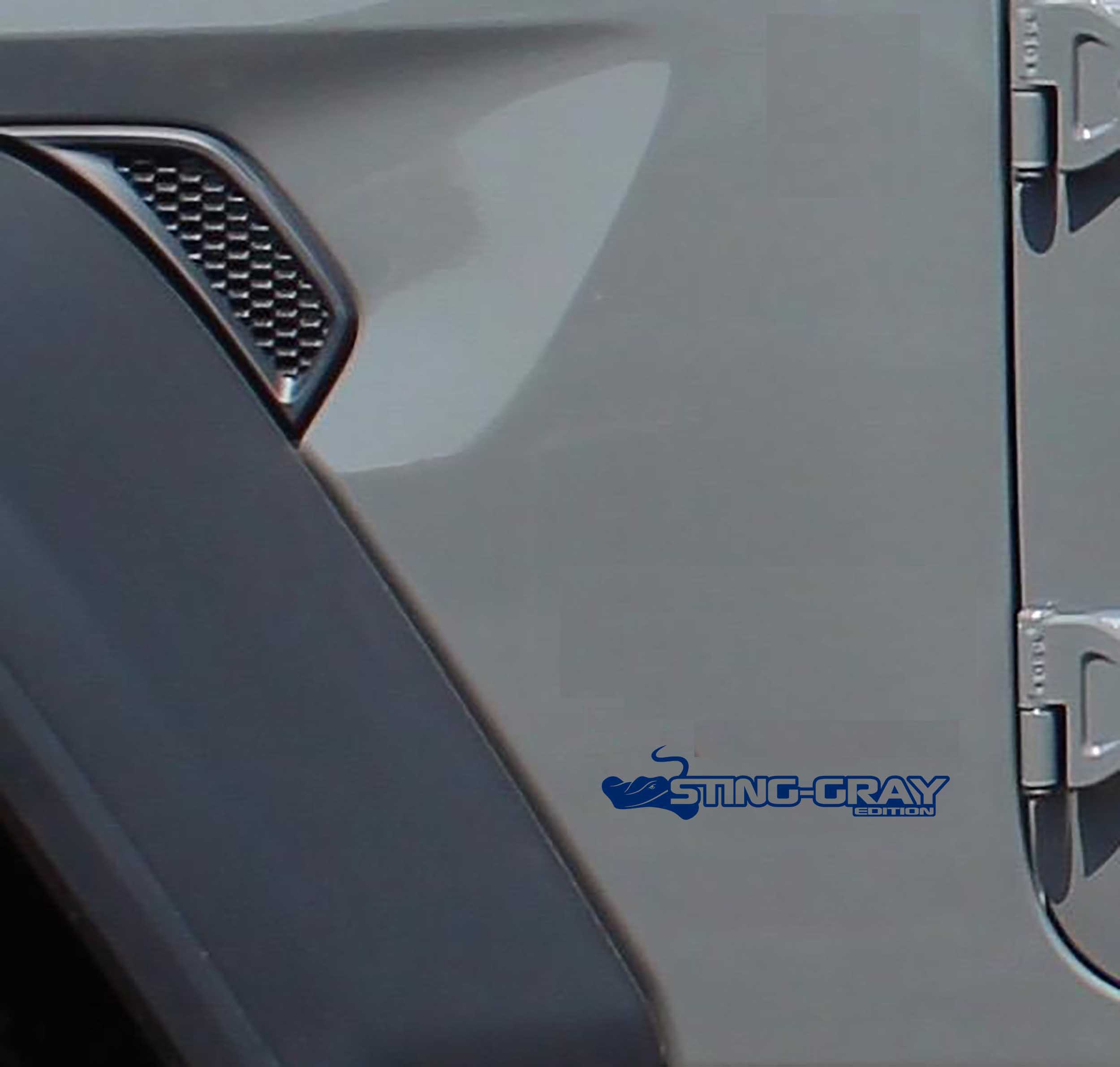 Sting-Gray Edition fender decal pair in navy blue vinyl with stingray head and edition text
