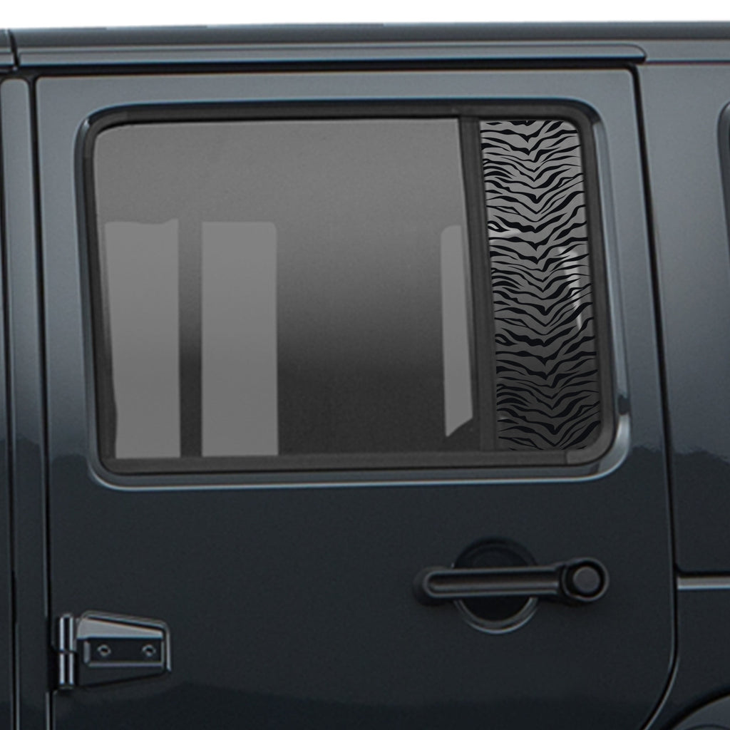 Black tiger print pattern side window decal pair shown on dark Jeep Wrangler JKU rear door window