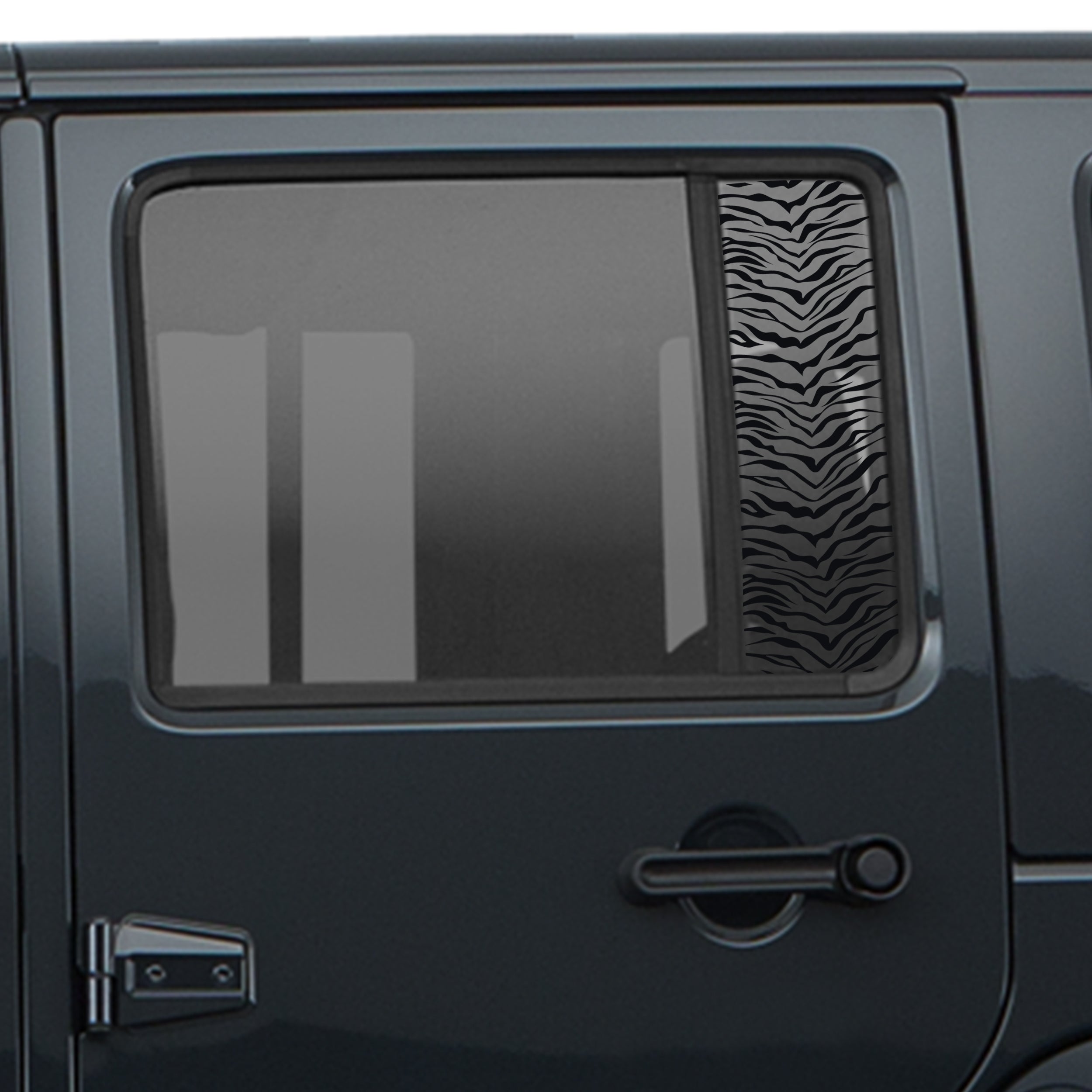 Black tiger print pattern side window decal pair shown on dark Jeep Wrangler JKU rear door window